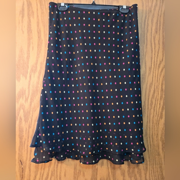 Very cute black skirt with multi colored dots on the sheer overlay. Size 6. - Picture 1 of 5